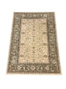 Persian design pale ground rug