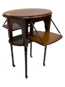 An unusual Edwardian mahogany drop leaf centre table