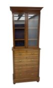 Edwardian walnut bookcase on chest