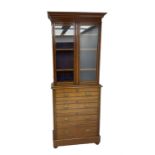 Edwardian walnut bookcase on chest