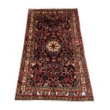 Persian Nahawand blue ground rug