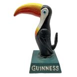 Reproduction cast iron Guinness toucan