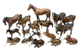 Large group of Beswick bay horse figures