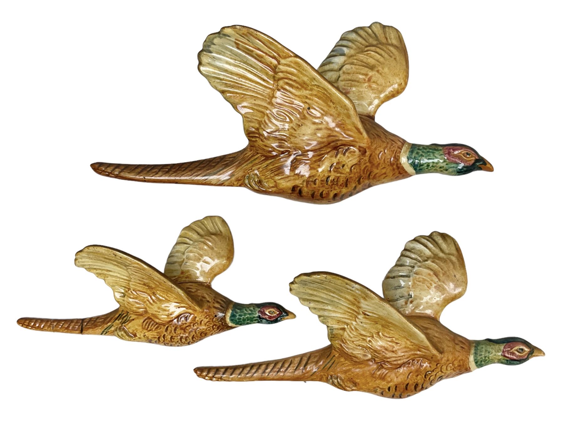 Set of three graduated Beswick Pheasant wall plaques comprising models 661/1