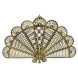 Pierced brass peacock style folding fire screen