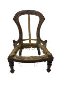 Late Victorian walnut and beech framed nursing chair