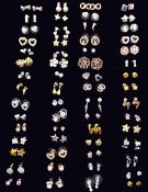 Sixty pairs of stud earrings including bow