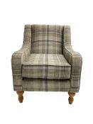 Armchair upholstered in checkered fabric