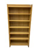 Oak open bookcase fitted with five adjustable shelves