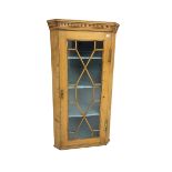 Early 19th century pine corner cabinet