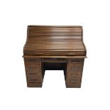 Early 20th century oak twin pedestal roll top desk