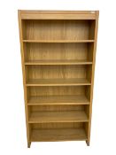 Oak open bookcase fitted with five adjustable shelves