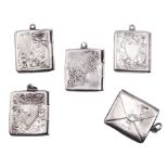 Five early 20th century silver stamp holders modelled in the form of envelopes