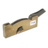 A 7/8" steel soled brass shoulder plane with ebony infill and wedge, minor hammer damage G