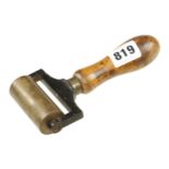 A 2 1/2" brass roller by PRESTON with beech handle G+