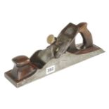 A 13 1/2" iron panel plane with brass screw and rosewood infill and handle G