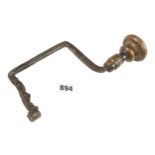 A 17/18c Scandinavian iron brace with elaborate spring to hold the bit G