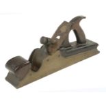 A nice quality Scottish bronze panel plane 13" x 2 1/2" with shapely rosewood infill and handle,