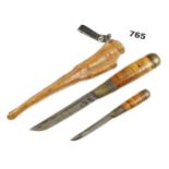 An unusual fine quality gentleman's travelling knife set of two straw wrapped brass handled knives