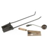 A tool for cleaning manholes, a trowel and a ladle G