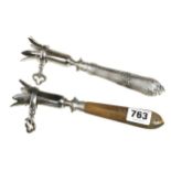 Two early hambone clamps with horn and silvered handles G+