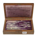 A 12 piece German silver drawing set in brass inlaid rosewood case G++