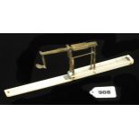 A very rare ivory cased brass guinea scale by A WILKINSON Ormskirk (Late of Kirby) near Liverpool,