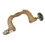 A brass plated lever pad beech brace by HOWARTH, head requires attention G