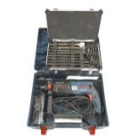 A BOSCH GBM 2-26 DRE SDS hammer drill 240v with a set of MAKITA SDS drill bits Pat tested