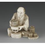 A fine ivory okimono of a potter at his wheel 4"h F