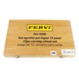 An unused set of 12 carving tools by FERVI in orig wood case F