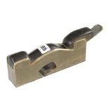 A steel soled brass shoulder plane 7 1/2" x 1 1/2" with ebony infill and wedge pitting to rear of