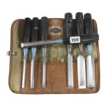 A set of 7 black handled chisels by STANLEY G+