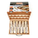 An unused set of 12 carving tools by POWERFIX in orig wood case F