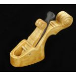 A recent violin maker's boxwood plane unusually in the shape of a violin, the sole 2 1/4" x 1 1/8"