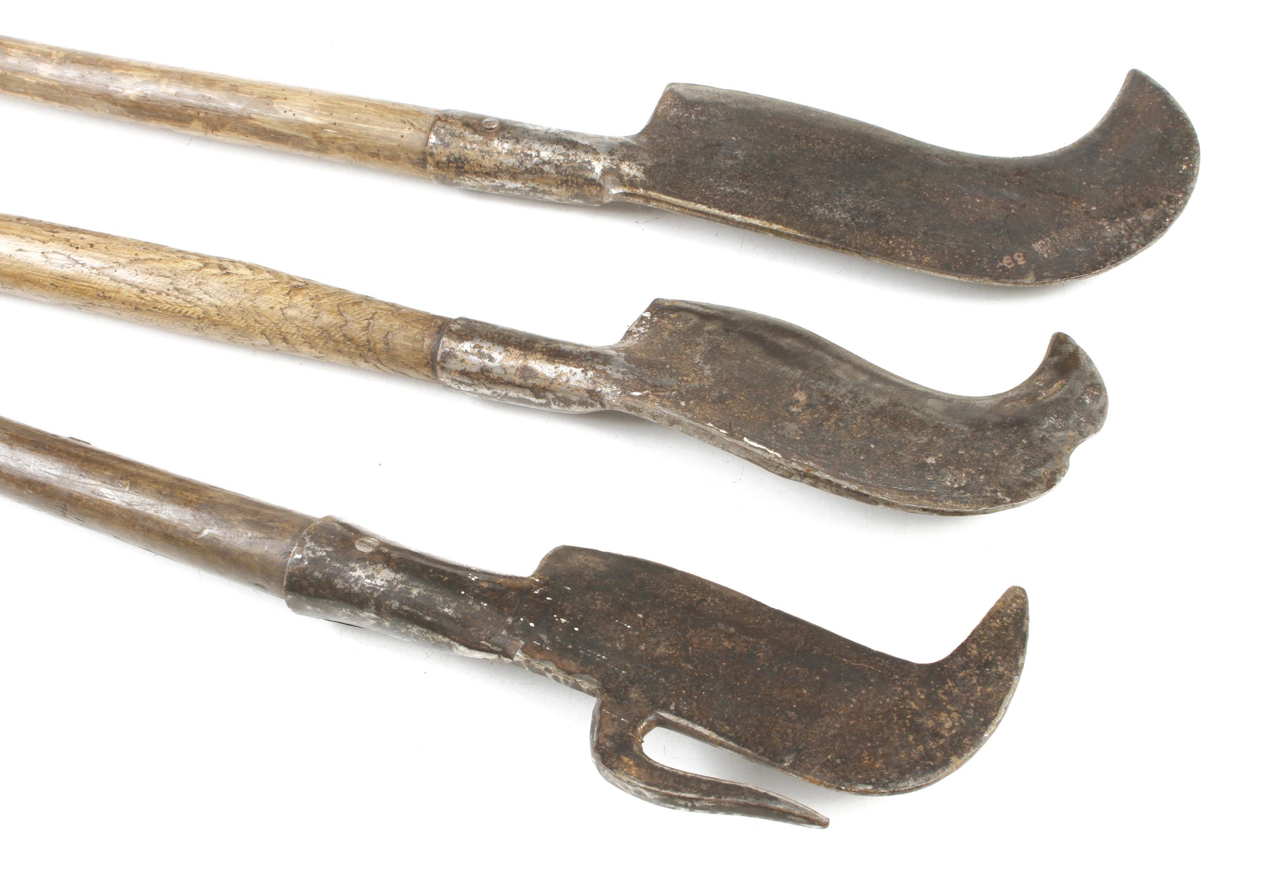 Three long handled French billhooks one with additional side hook G+ - Image 2 of 2