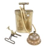 A brass garden sprayer a sprinkler and a copper dolly G