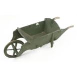 An early child's wheelbarrow 32" o/a, 11"h. one leg needs replacing G