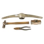 Four brass and bronze tools ie. pick axe, lump hammer heads, hammer and pliers G++