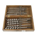 A set of 12 RUSSELL JENNINGS bits in oak box with spring type retainer G+