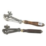 Two French long handled hand vices G