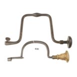 A wagon brace marked Wrot 16" and another iron brace G