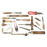 A corkscrew and various miniature tools G