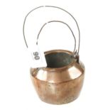 A 3 1/2" copper glue pot marked 2 G+