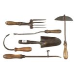 A daisy grubber, asparagus cutter and 4 vintage garden tools G