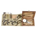 A small set of drawing instruments, six small G cramps and a gauge G