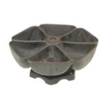 An iron nail cup by AJK G+