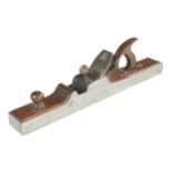 A 22 1/2" iron jointer with shapely mahogany infill and handle and brass lever G+