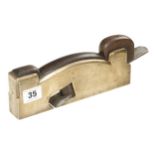 A brass shoulder plane 8" x 1 1/4" with rosewood infill and wedge G