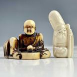 A Japanese stained ivory netsuke, Meiji period, height 3.5cm and another ivory netsuke, Meiji